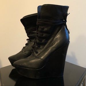 Also lace up high witchy boots